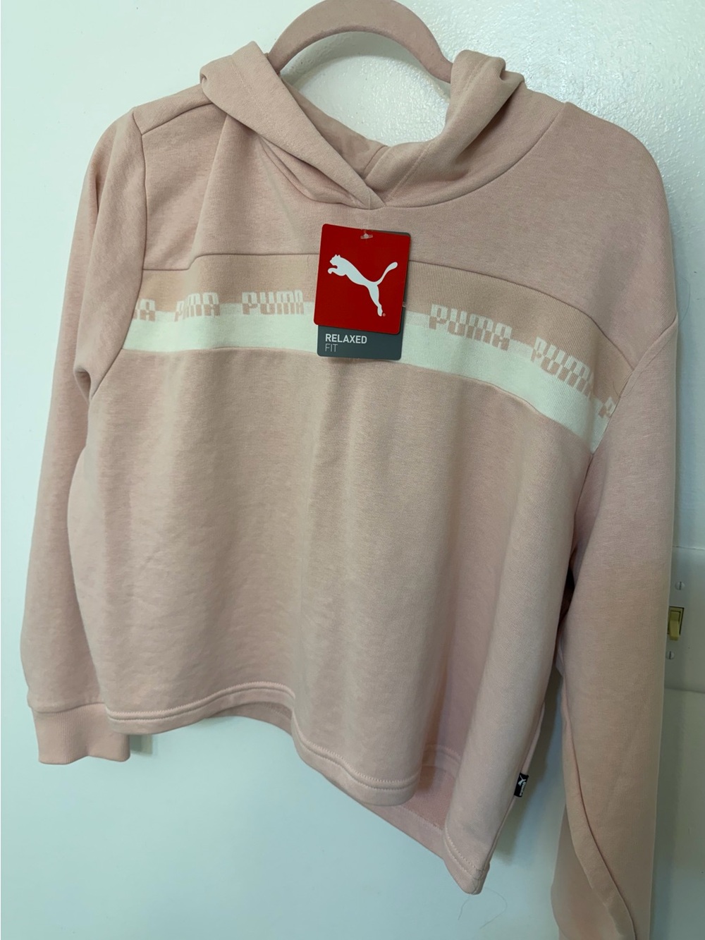 Puma Amplified Logo Stripe Cropped Hoodie in a light pink color